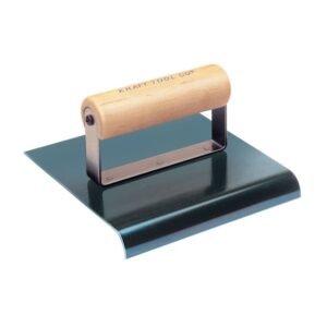6" x 4" blue steel edger with wood handle in use.
